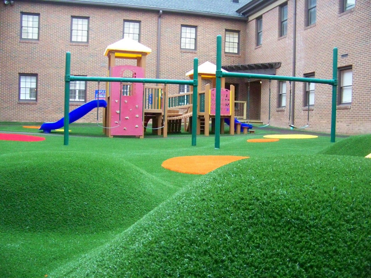 Hilly artificial turf playground by Southwest Greens of Southern California